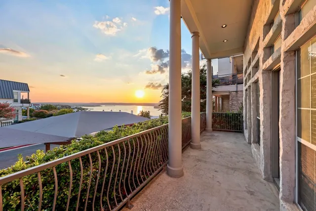 a view of a balcony with city view