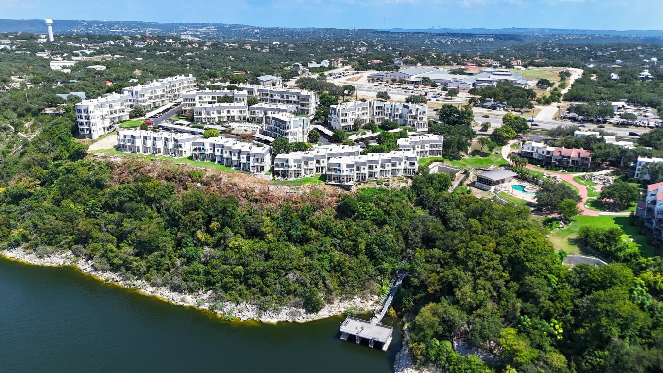 2918 Ranch Road 620 North, Unit X201 Austin, TX 78734 - Photo 29 of 30 an aerial view of residential building with outdoor space and trees