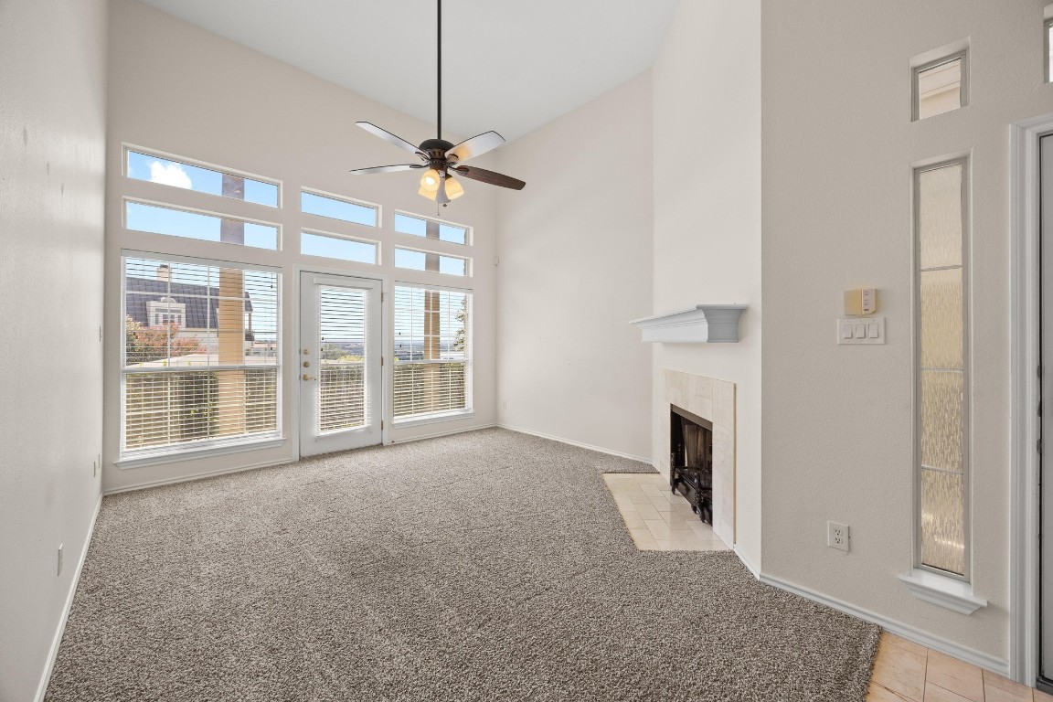2918 Ranch Road 620 North, Unit X201 Austin, TX 78734 - Photo 10 of 30 a view of empty room with fireplace