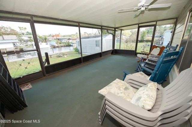 a bed room with a bed and a window