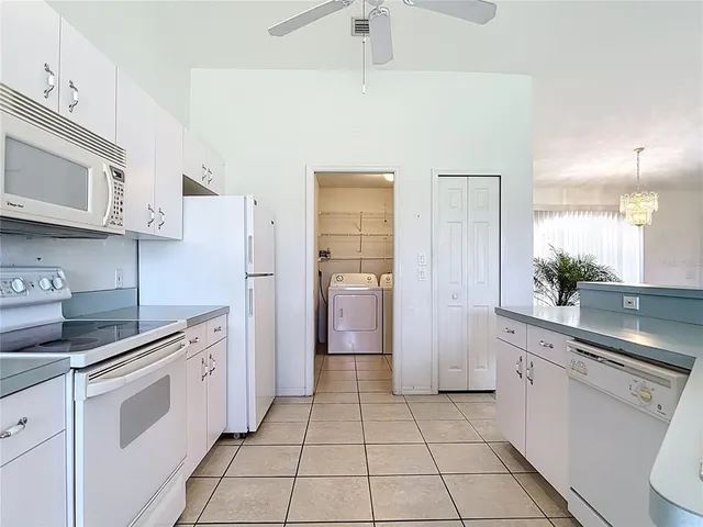 a view of a livingroom and a bathroom