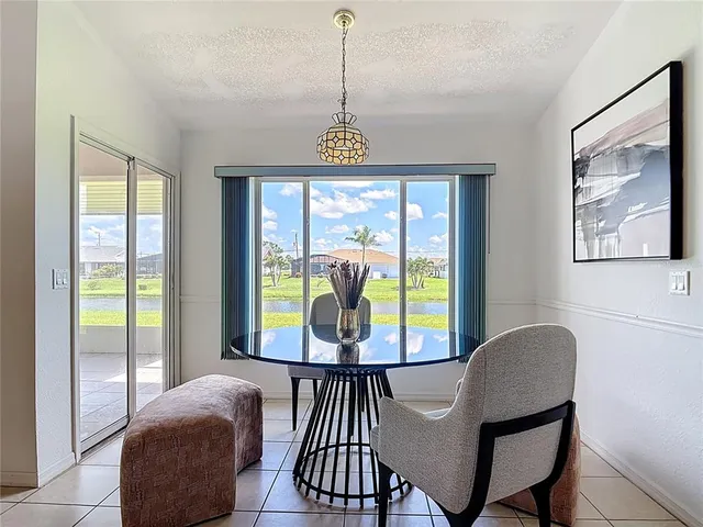a view of a livingroom with furniture and windows