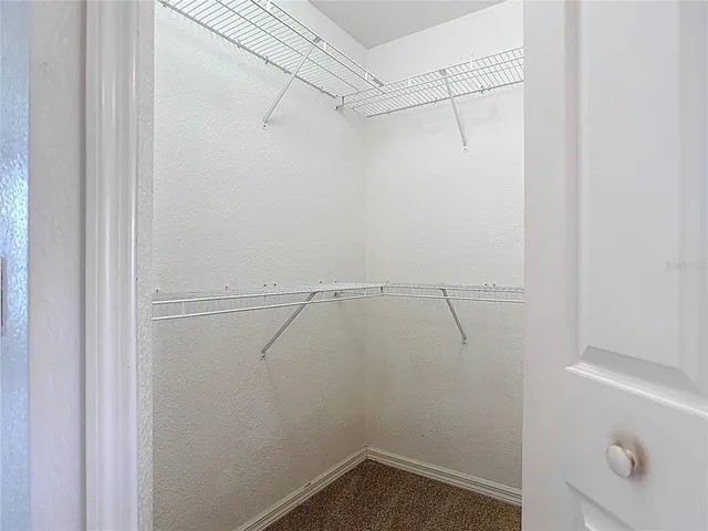 a view of a livingroom with a staircase