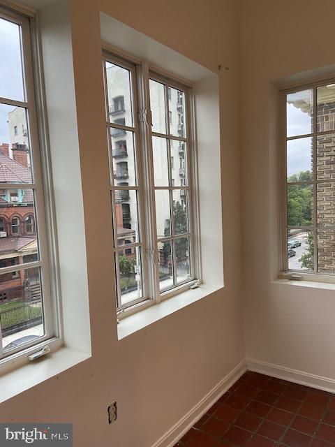 2511 Eutaw Place, Unit 402 Baltimore, MD 21217 - Photo 14 of 18 a view of an empty room with a window