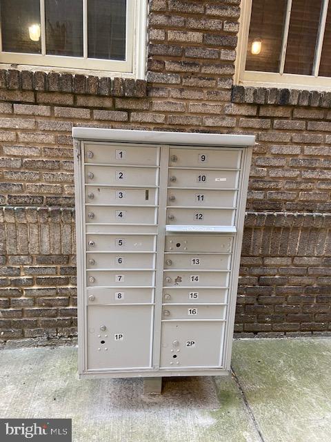 2511 Eutaw Place, Unit 402 Baltimore, MD 21217 - Photo 18 of 18 a view of wooden cabinets