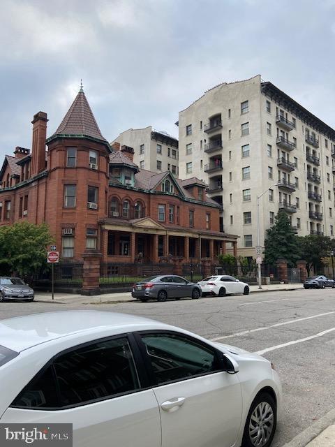 2511 Eutaw Place, Unit 402 Baltimore, MD 21217 - Photo 3 of 18 a front view of a building with street view