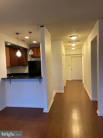 a view of a living room with a flat screen tv