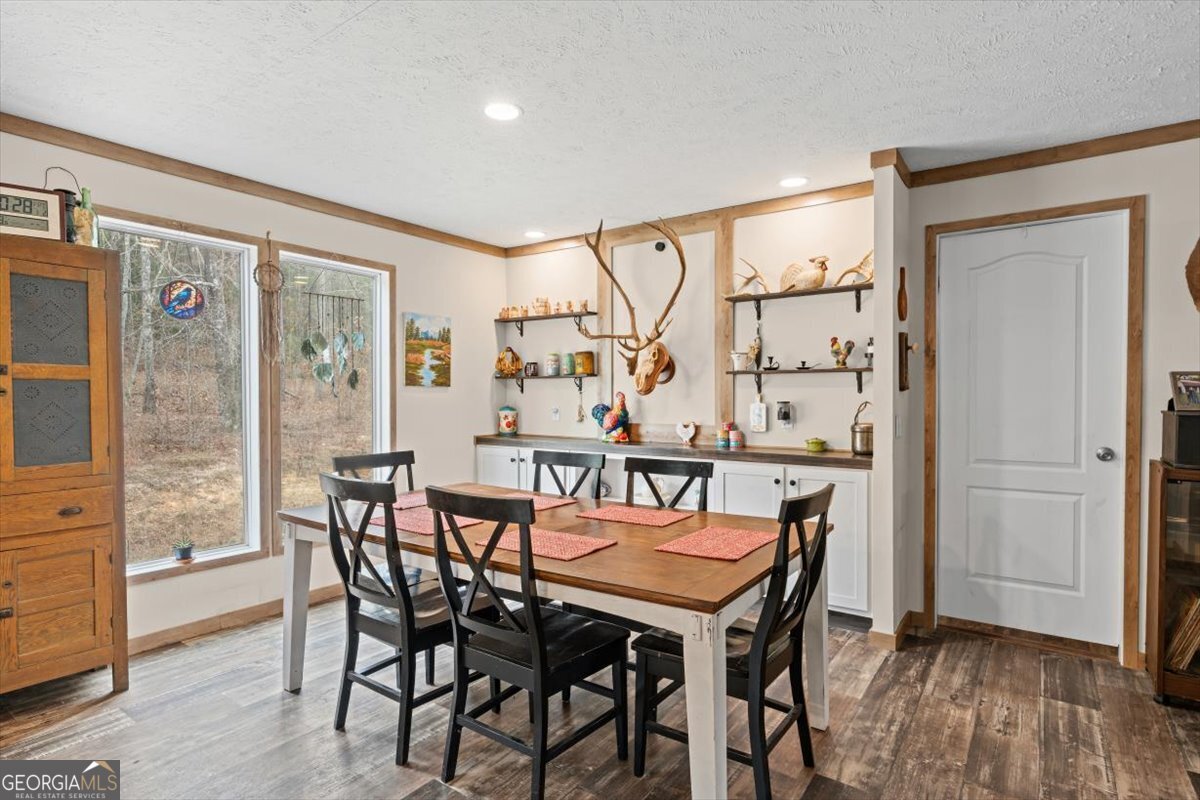 152 Campbell Road Cedartown, GA 30125 - Photo 18 of 42 a dining room with furniture and wooden floor