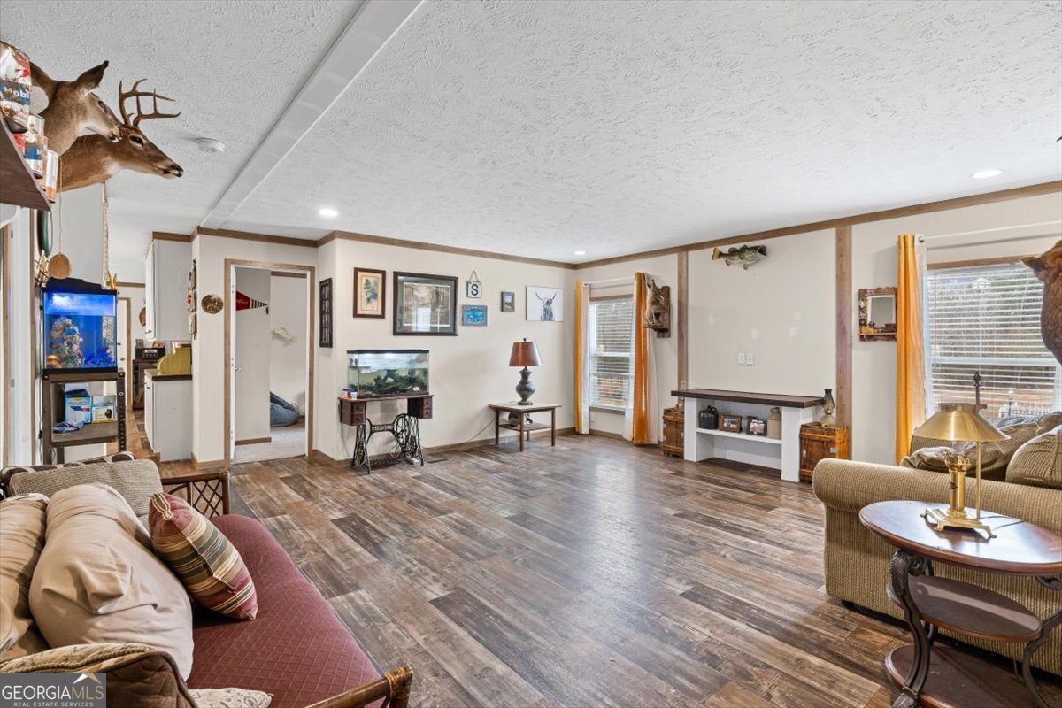 152 Campbell Road Cedartown, GA 30125 - Photo 28 of 42 a living room with furniture and a table