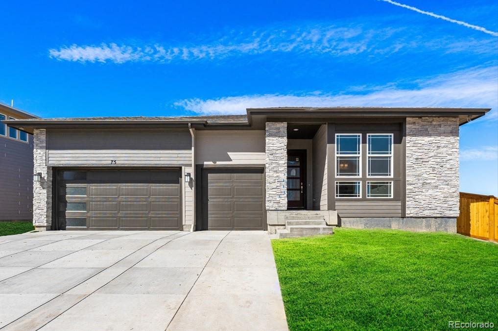 75 Clara Place Castle Pines, CO 80108 - Photo 1 of 39 a front view of a house with a yard
