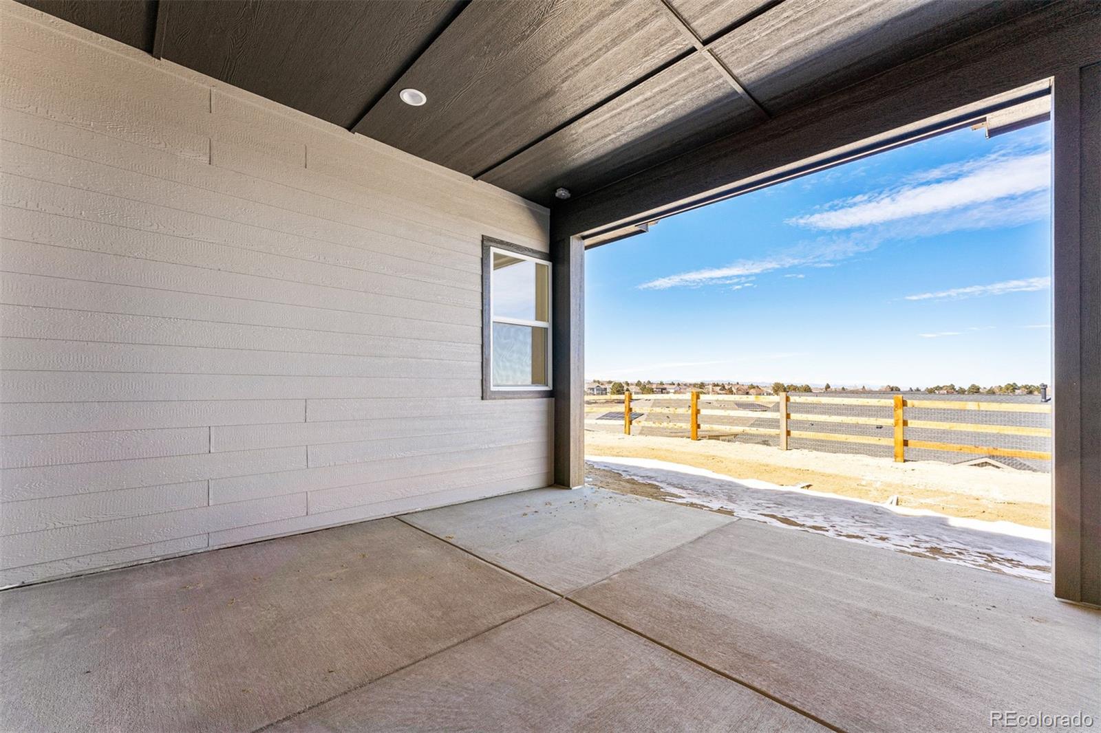 75 Clara Place Castle Pines, CO 80108 - Photo 14 of 39 a view of an empty room and window