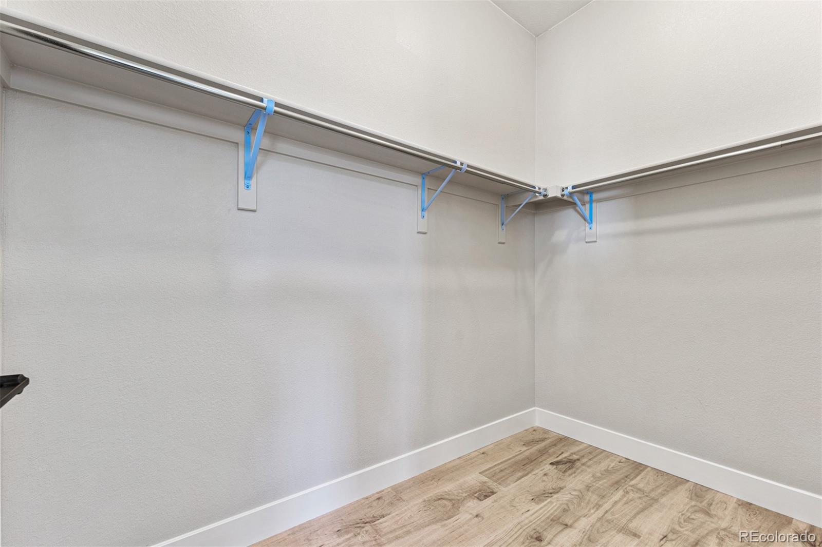 75 Clara Place Castle Pines, CO 80108 - Photo 21 of 39 a view of a room with shelf