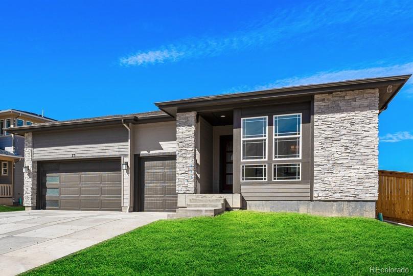 75 Clara Place Castle Pines, CO 80108 - Photo 3 of 39 a view of front of a house with a yard