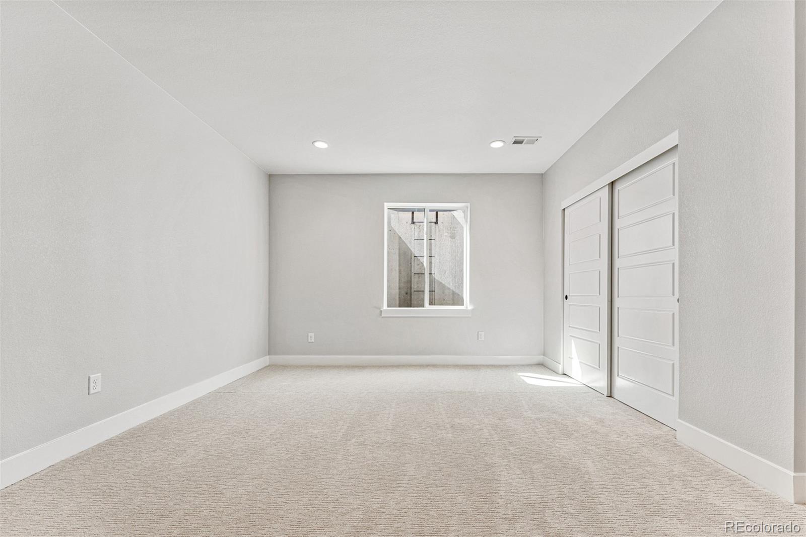 75 Clara Place Castle Pines, CO 80108 - Photo 34 of 39 a view of an empty room with a window
