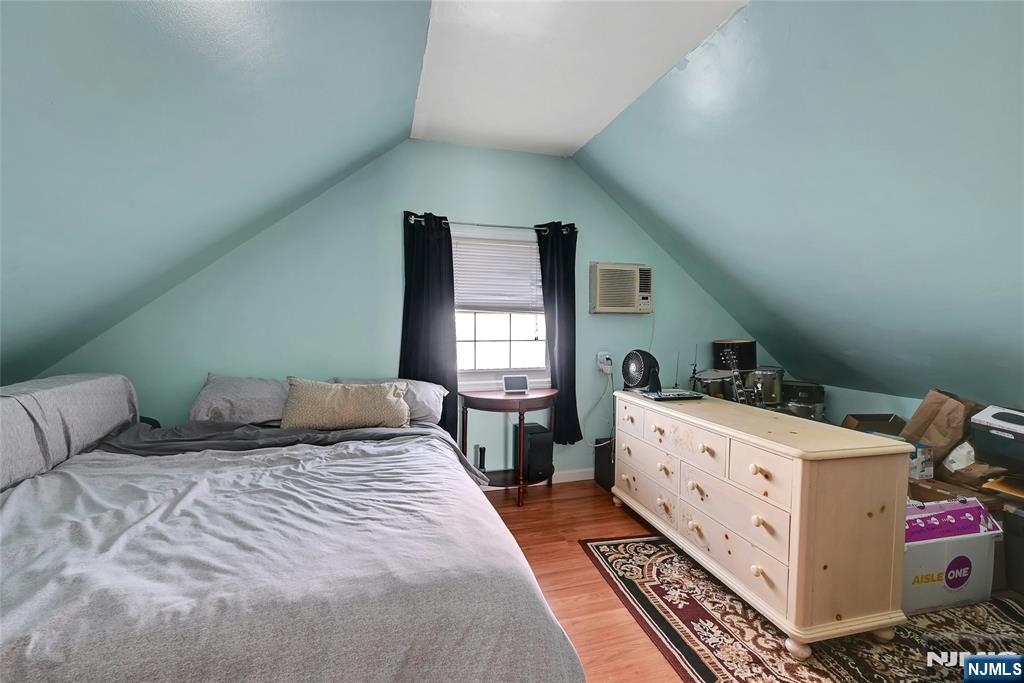 85 Edison Street Clifton, NJ 07013 - Photo 22 of 28 a bedroom with a bed and a window