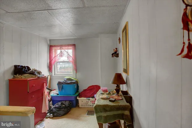 a room with furniture and a window