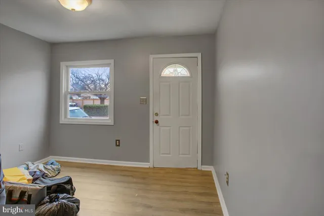 a view of room with window and bathroom