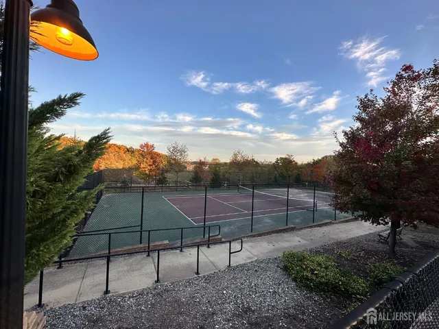 a view of a hallway with seating area