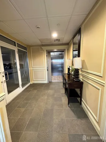 a view of swimming pool from a balcony