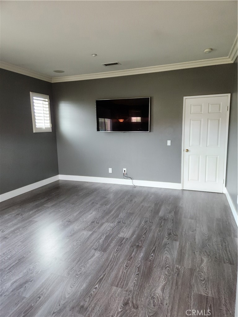4540 Springleaf Lane Riverside, CA 92505 - Photo 28 of 32 a view of empty room with wooden floor