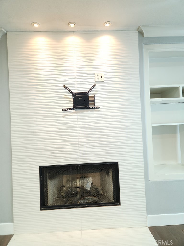 4540 Springleaf Lane Riverside, CA 92505 - Photo 7 of 32 a bathroom with a sink a mirror and shower