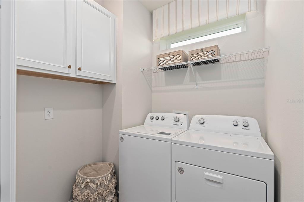 6300 Dew Drop Loop St. Cloud, FL 34771 - Photo 29 of 29 a utility room with dryer and washer