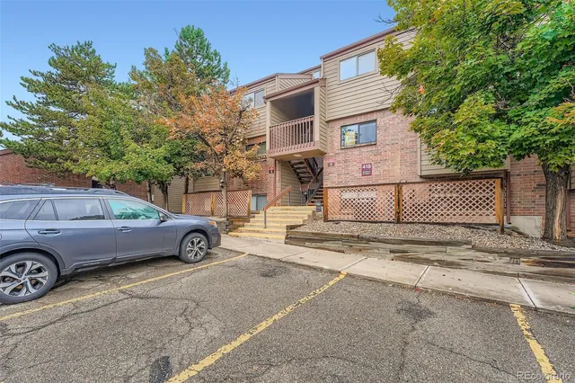 a view of parking space with a street
