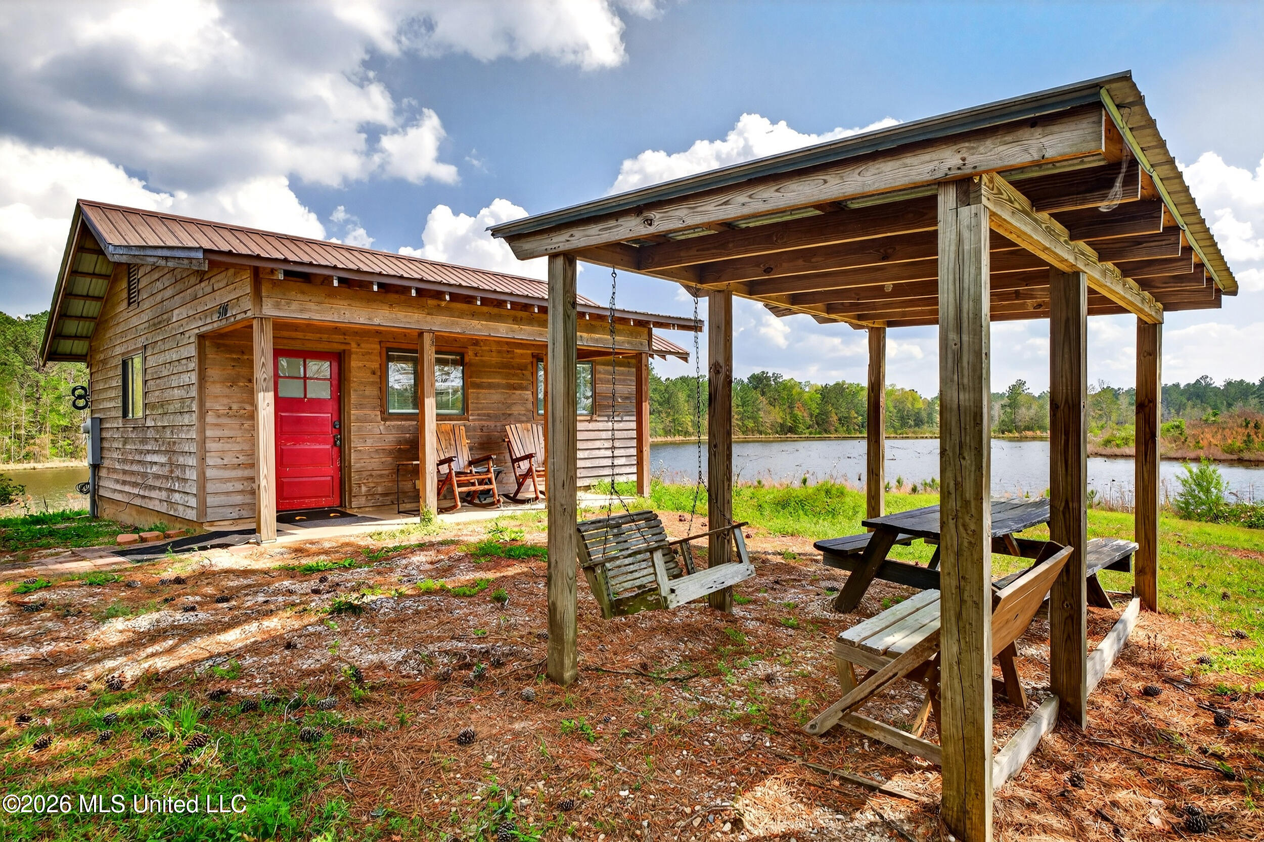 554 Homer Ladner Road Poplarville, MS 39470 - Photo 44 of 68 44_cabin exterior 1