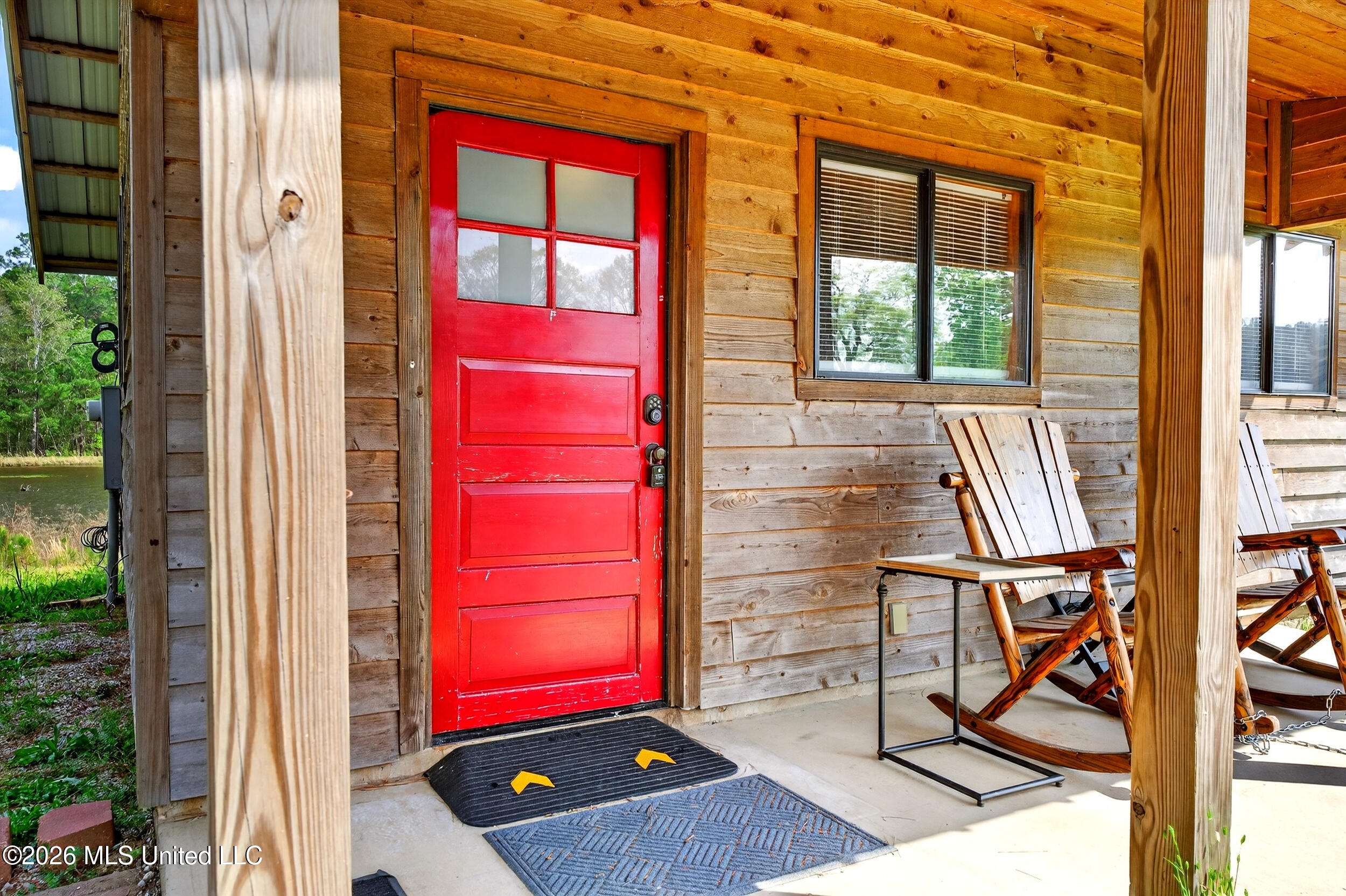 554 Homer Ladner Road Poplarville, MS 39470 - Photo 46 of 68 46_cabin front door