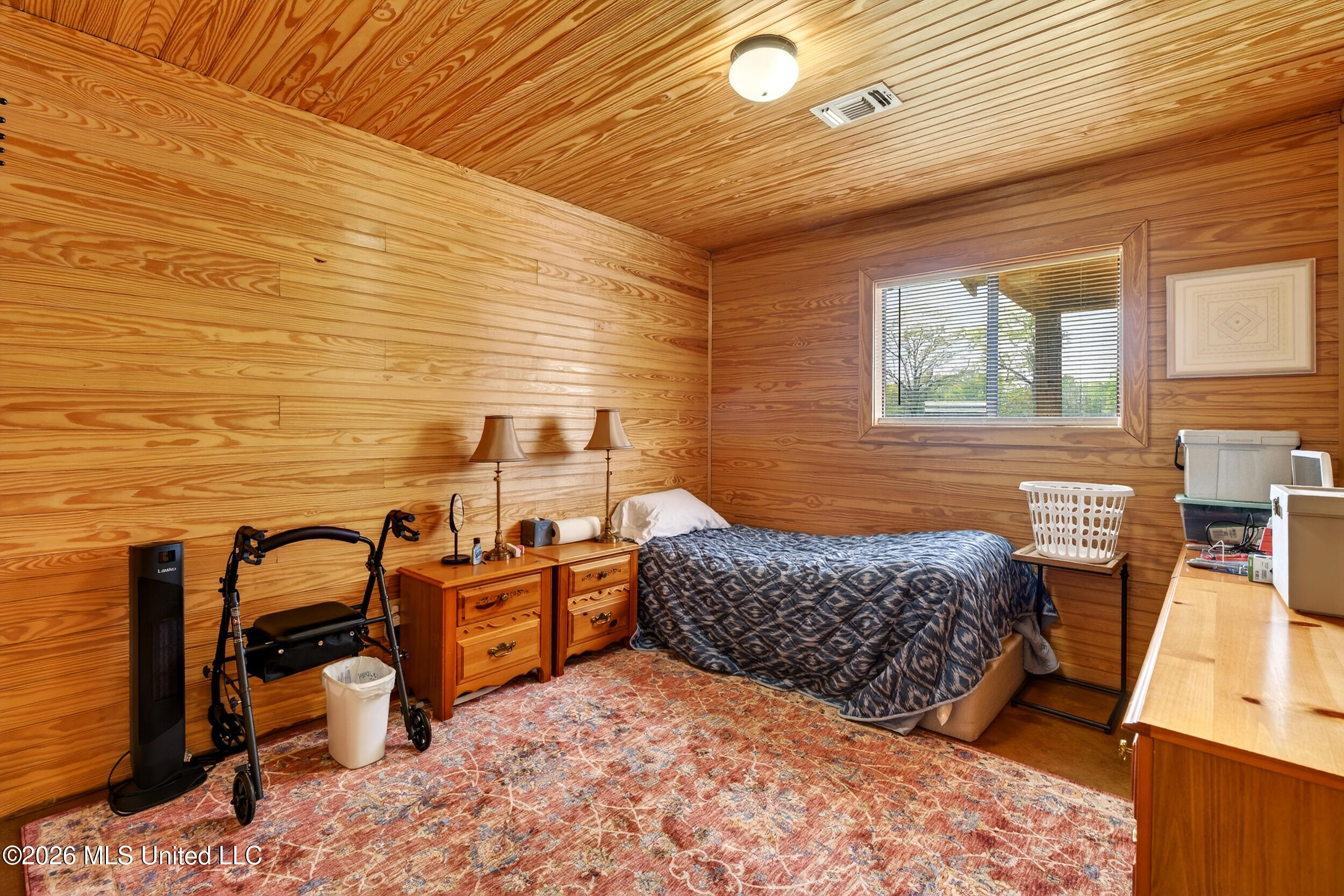 554 Homer Ladner Road Poplarville, MS 39470 - Photo 53 of 68 53_cabin bedroom
