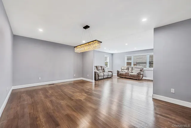 a view of livingroom with furniture and wooden floor