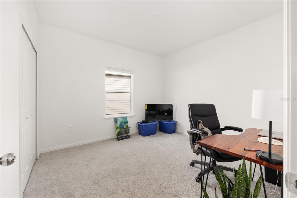 8972 Southwest 69th Terrace Ocala, FL 34476 - Photo 22 of 42 a view of a workspace with furniture
