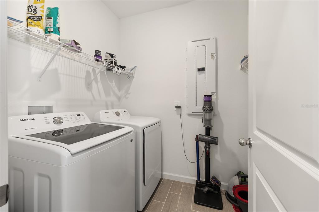 8972 Southwest 69th Terrace Ocala, FL 34476 - Photo 30 of 42 a utility room with dryer and washer