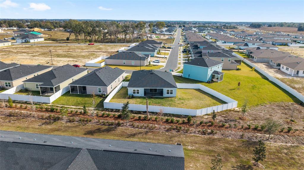 8972 Southwest 69th Terrace Ocala, FL 34476 - Photo 37 of 42 an aerial view of a house with a ocean view