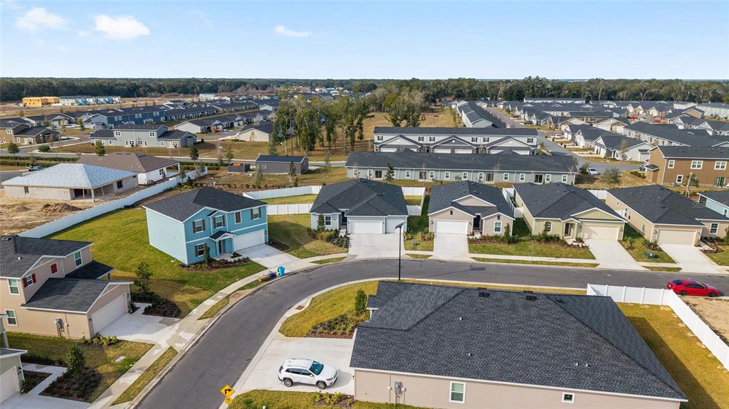 8972 Southwest 69th Terrace Ocala, FL 34476 - Photo 38 of 42 an aerial view of a house with a ocean view