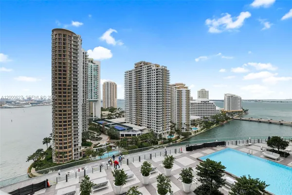 a view of a city with tall buildings