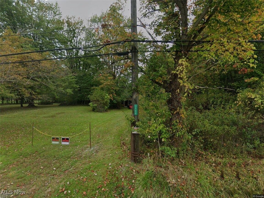 3501 Padanarum Road Geneva, OH 44041 - Photo 2 of 2 View of green lawn