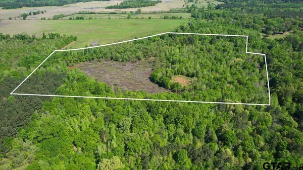 a view of a balcony and tennis court