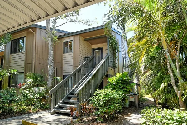a house view with a garden space