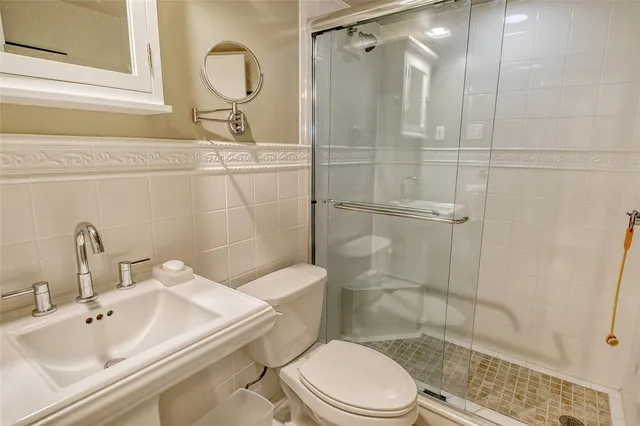 a backyard of a house with lots of swings and plants