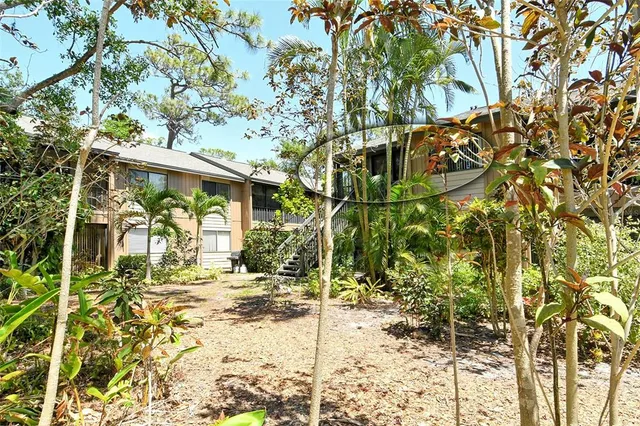 a view of a swimming pool with a lounge chairs