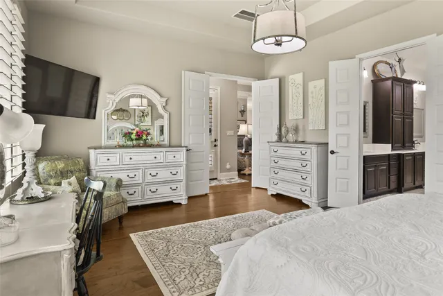 a bedroom with a bed and furniture