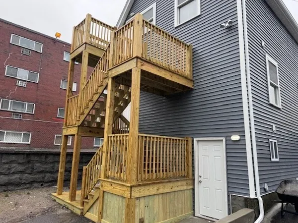 a view of a house with a street