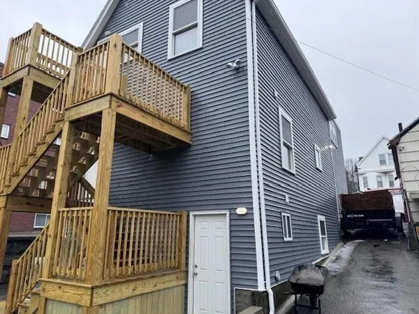 a view of a house with a deck