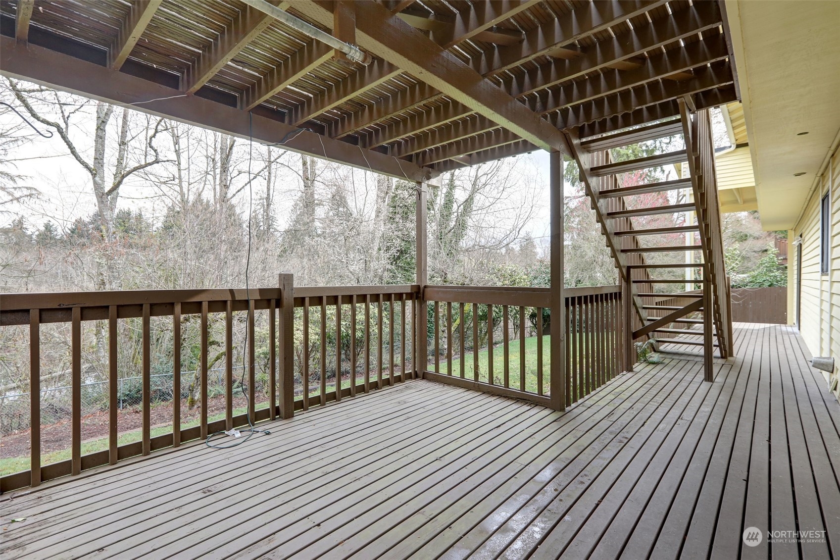12404 Southeast 227th Street Kent, WA 98031 - Photo 19 of 21 a view of balcony with wooden floor