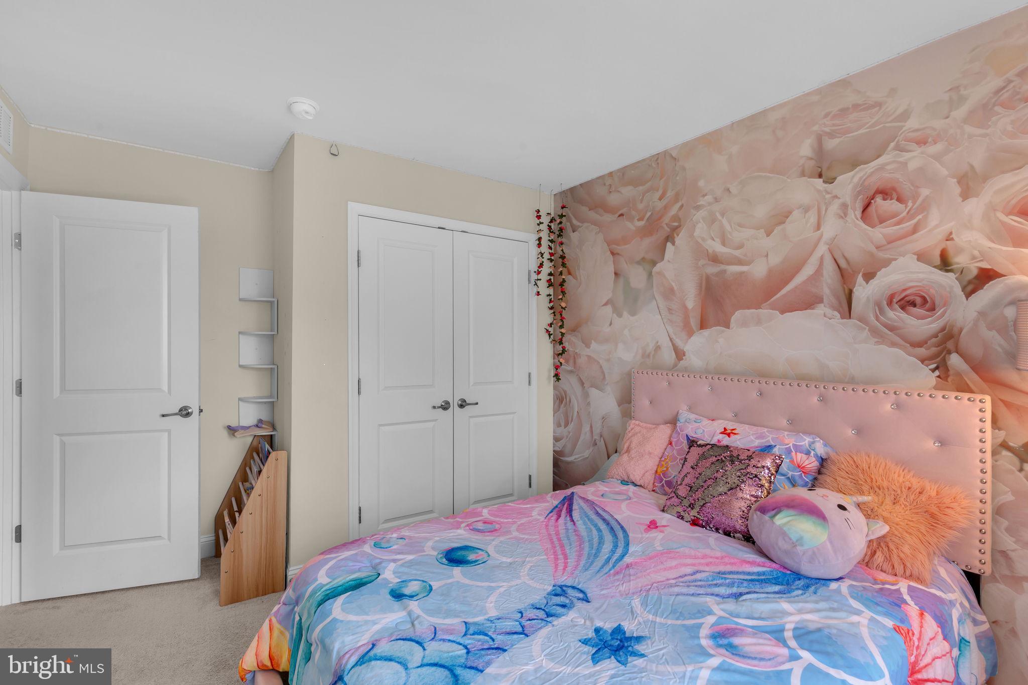 5007 East Joppa Road Perry Hall, MD 21128 - Photo 19 of 28 a bedroom with a bed and a lamp