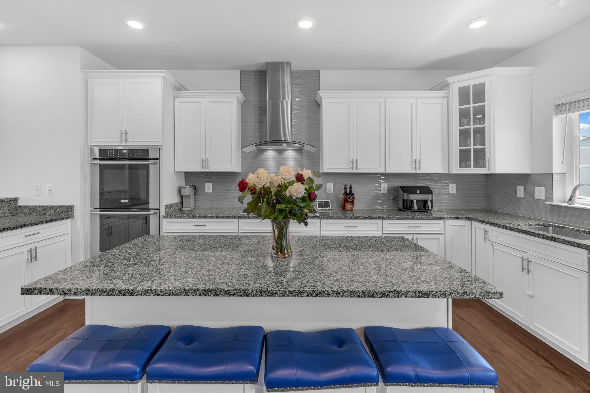 5007 East Joppa Road Perry Hall, MD 21128 - Photo 8 of 28 a kitchen with stainless steel appliances granite countertop a sink a stove and a granite counter tops