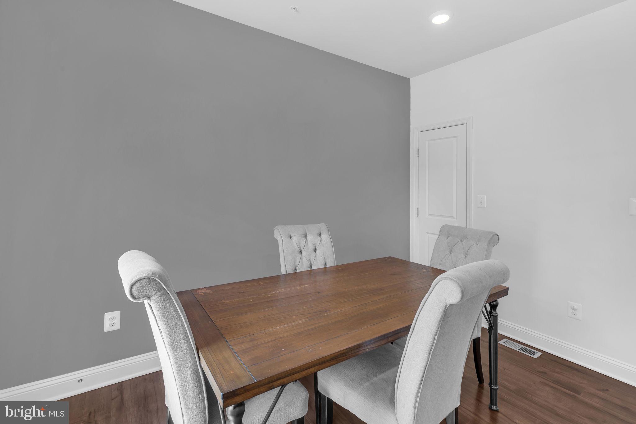 5007 East Joppa Road Perry Hall, MD 21128 - Photo 9 of 28 a view of a dining room with furniture