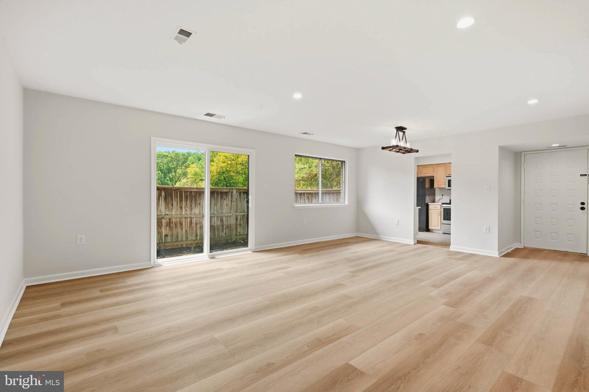 10901 Trotting Ridge Way, Unit 92 Columbia, MD 21044 - Photo 12 of 37 Bright and airy open space awaits.