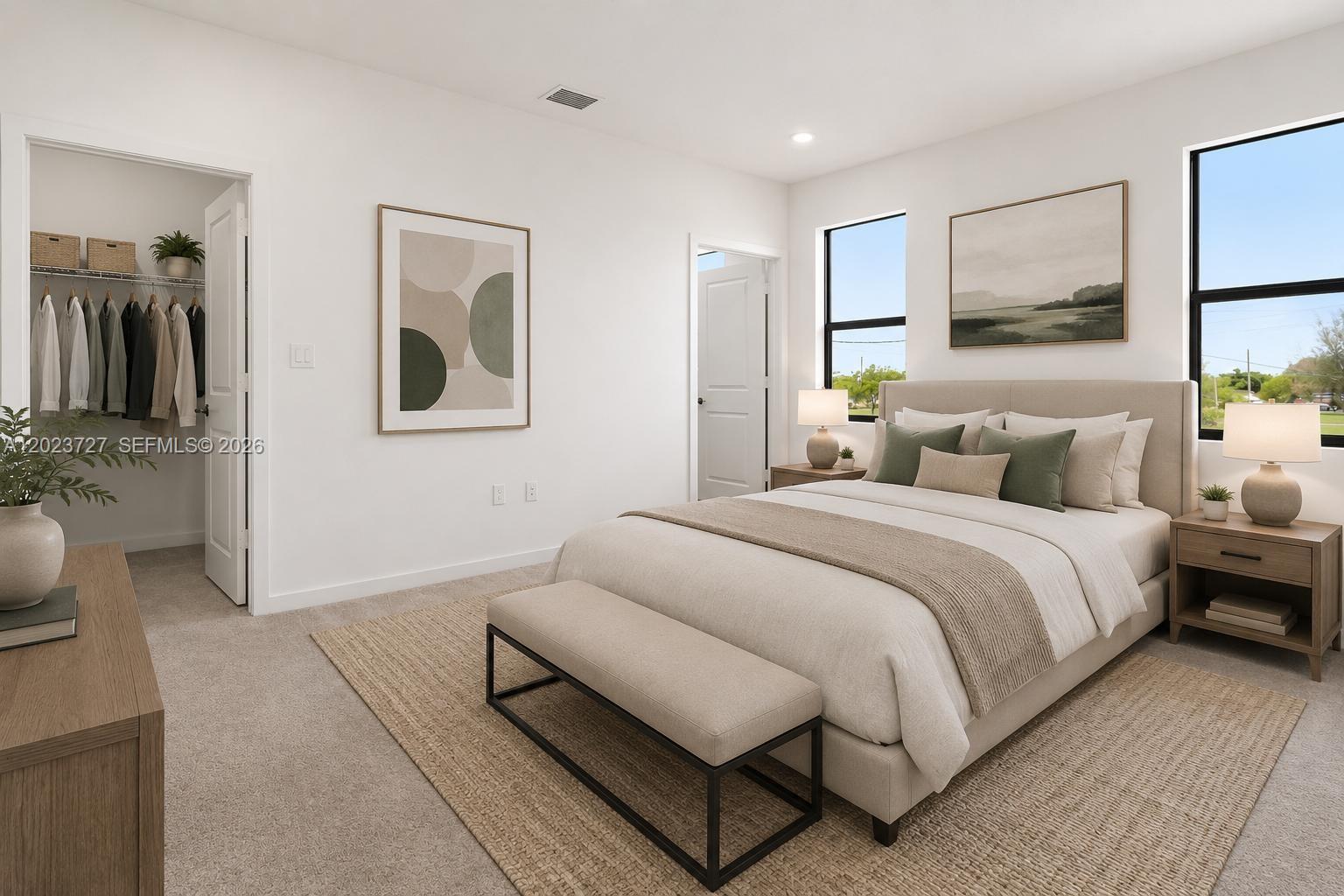 22348 Southwest 115th Court, Unit 22348 Miami, FL 33170 - Photo 20 of 37 a bedroom with a bed and a couch